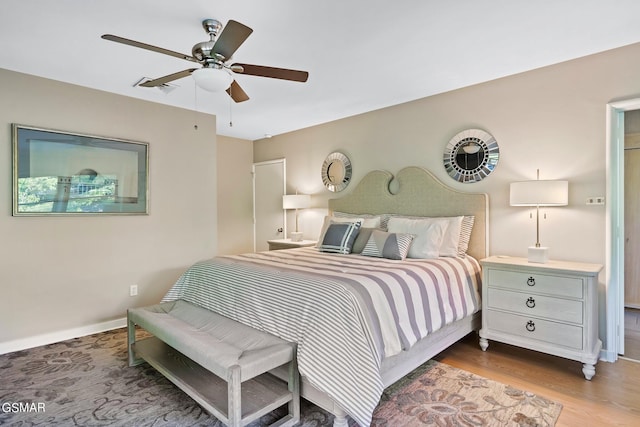 bedroom featuring ceiling fan and wood-type flooring