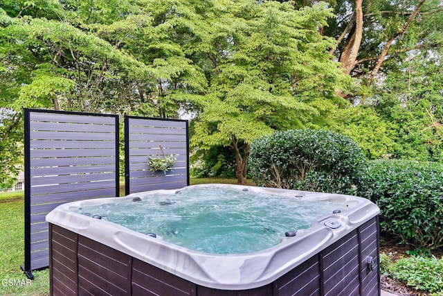 exterior space featuring a hot tub