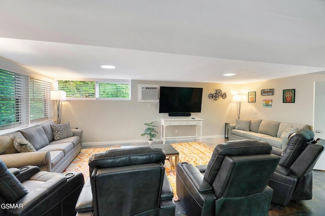 living room featuring a wall unit AC