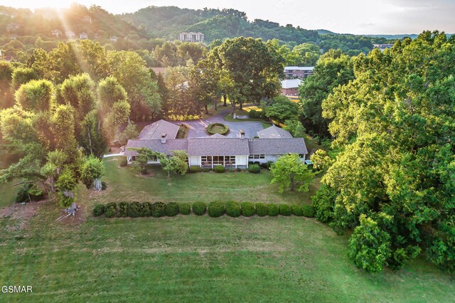 birds eye view of property with a mountain view