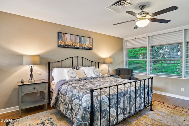 bedroom featuring ceiling fan and wood-type flooring