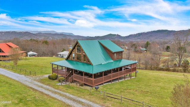 exterior space featuring a mountain view