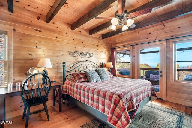 bedroom featuring access to exterior, ceiling fan, wooden ceiling, beamed ceiling, and hardwood / wood-style flooring