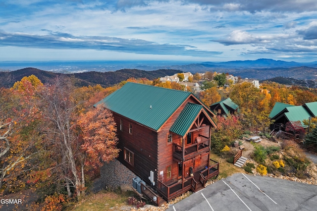 birds eye view of property featuring a mountain view