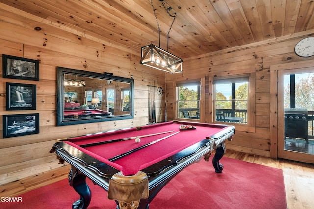 rec room featuring wood walls, wood-type flooring, wood ceiling, and billiards