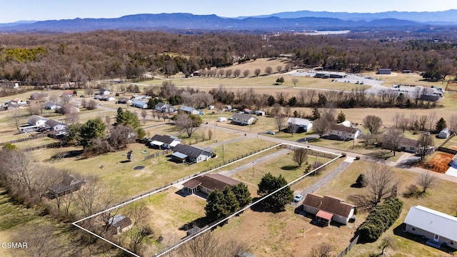 bird's eye view with a mountain view and a rural view