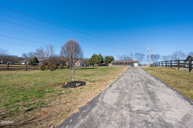 view of street featuring driveway