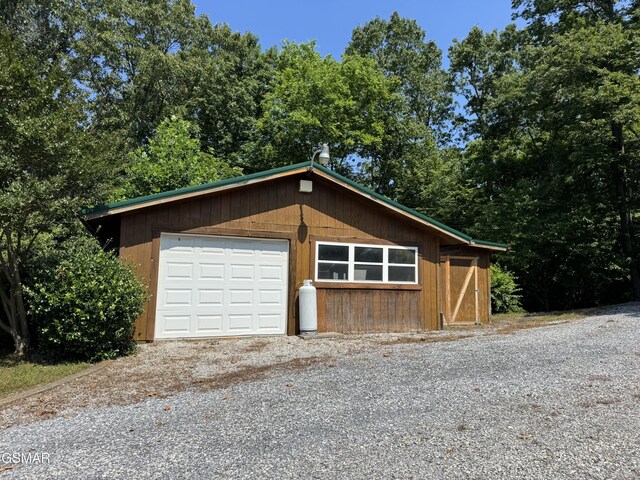 2452 Skyview Way, Dandridge, TN 37725 - garage with gravel driveway