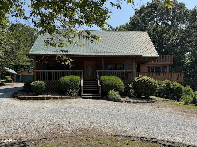 2452 Skyview Way, Dandridge, TN 37725 - view of front of home with a porch, metal roof, driveway, and stairs