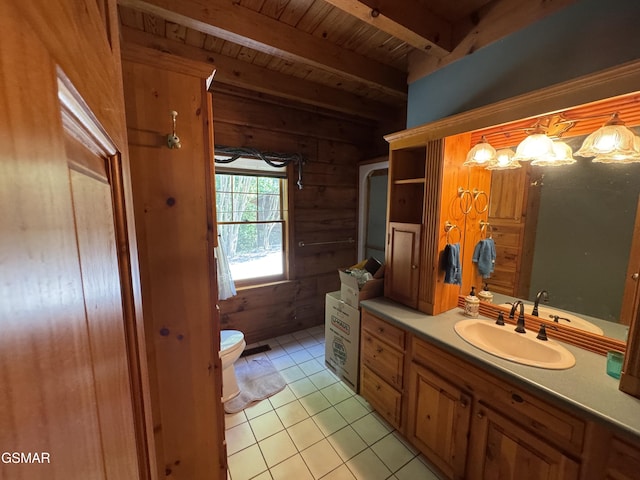 2452 Skyview Way, Dandridge, TN 37725 - bathroom featuring wood ceiling with exposed beams, toilet, vanity, and tile patterned flooring