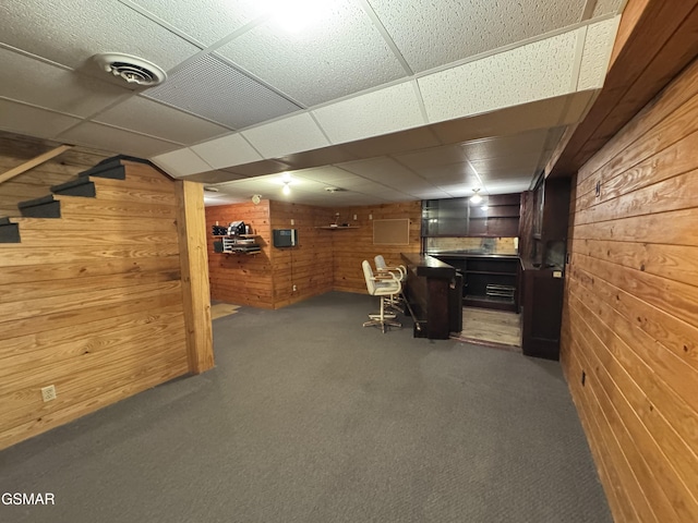 2452 Skyview Way, Dandridge, TN 37725 - finished basement featuring wood walls, carpet flooring, a bar, and a drop ceiling
