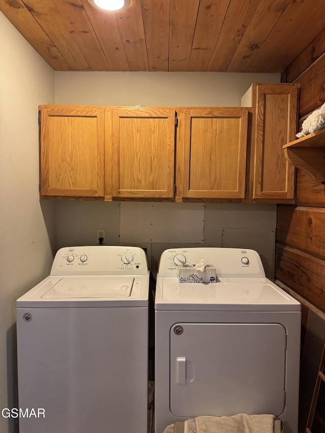 2452 Skyview Way, Dandridge, TN 37725 - laundry room featuring cabinet space, washer and clothes dryer, and wood ceiling