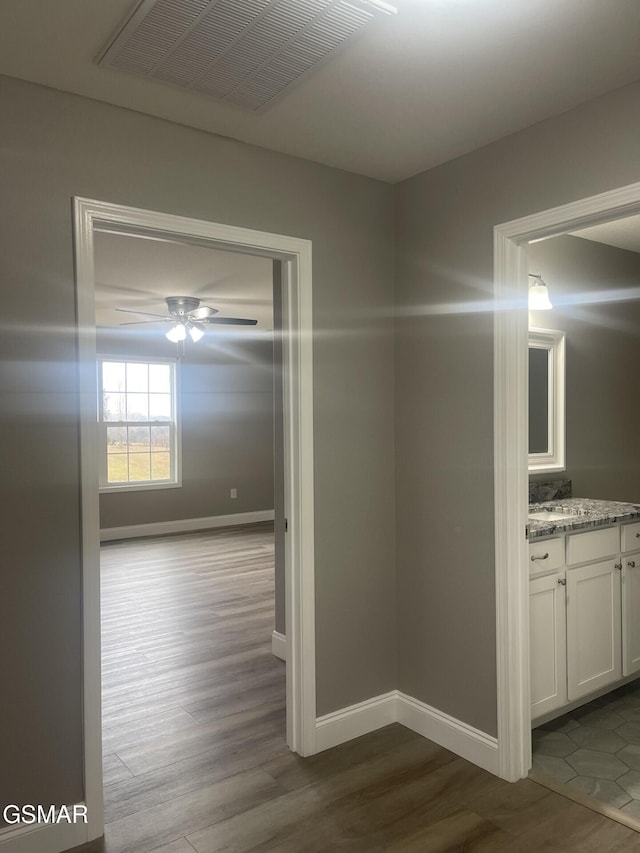 hall featuring hardwood / wood-style flooring