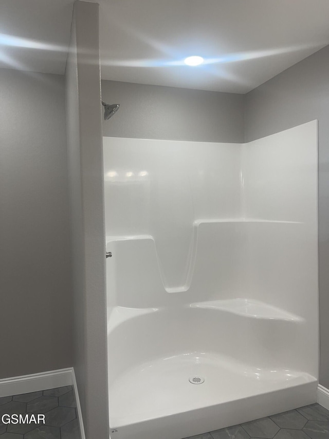 bathroom featuring tile patterned flooring