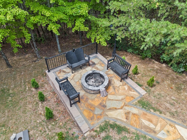 view of patio / terrace with an outdoor fire pit