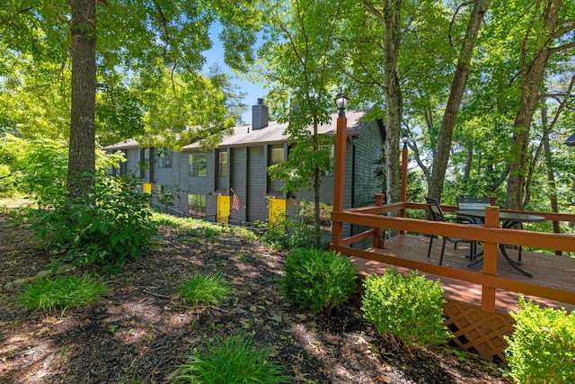 view of yard featuring a deck