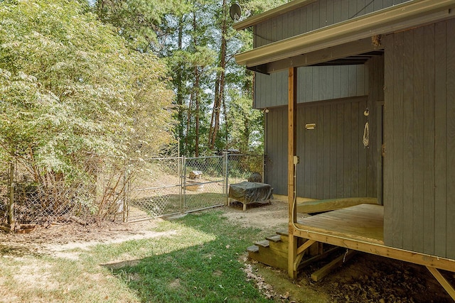 view of yard with fence and a gate