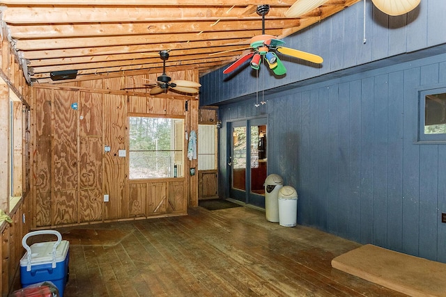 unfurnished sunroom featuring ceiling fan and lofted ceiling