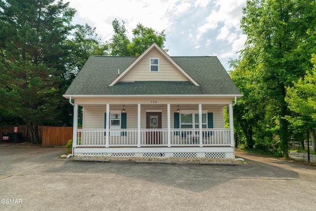 134 Roaring Fork Rd, Gatlinburg, TN 37738 - view of front of home featuring covered porch and a shingled roof