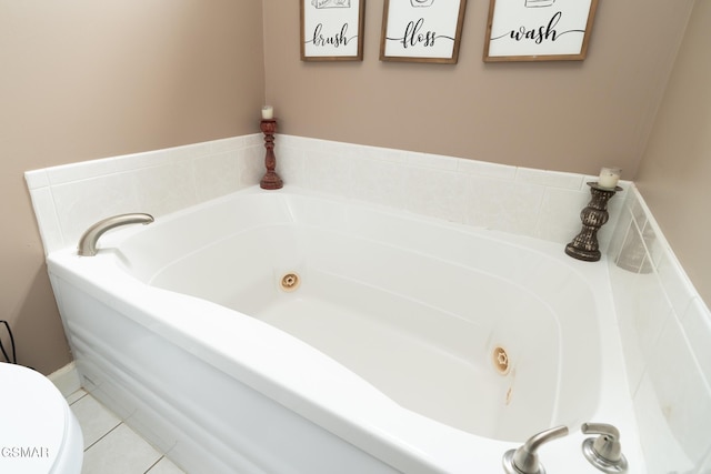 134 Roaring Fork Rd, Gatlinburg, TN 37738 - bathroom featuring a whirlpool tub and tile patterned floors