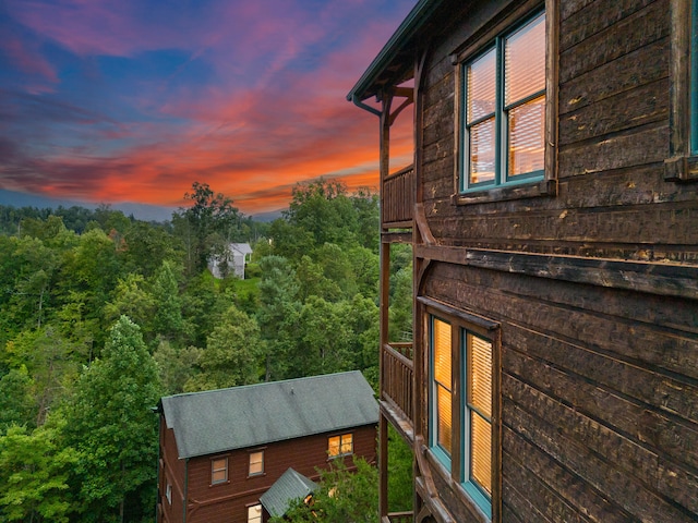 view of property exterior at dusk