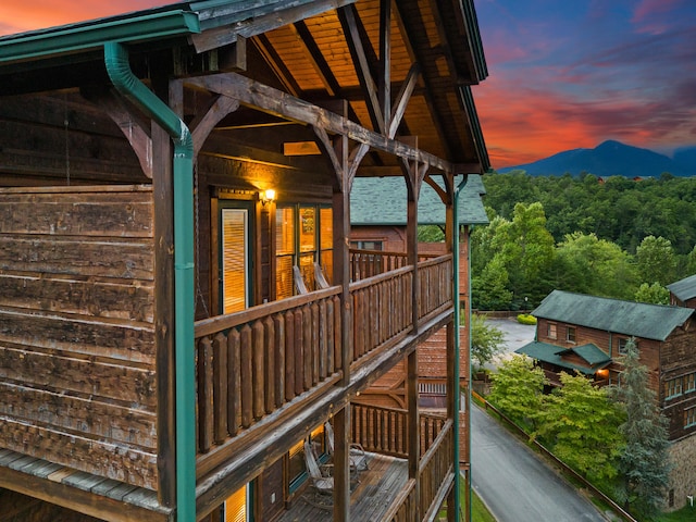 deck at dusk with a mountain view