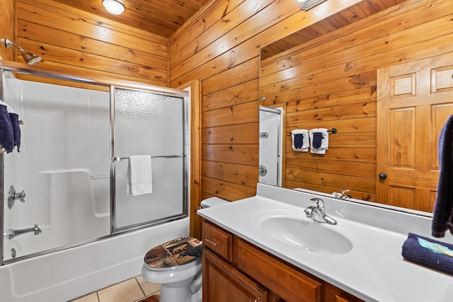 full bathroom featuring tile patterned flooring, combined bath / shower with glass door, and wooden walls