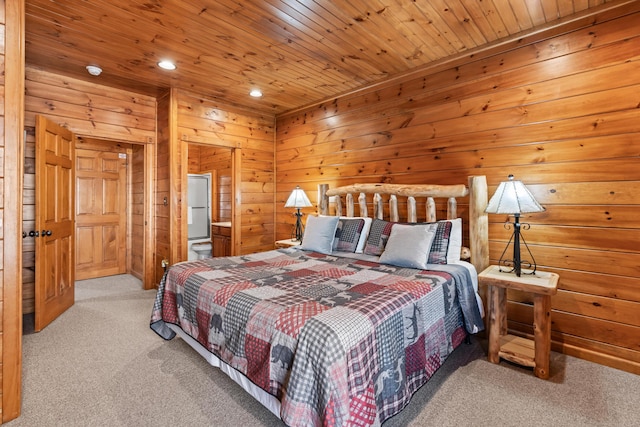 bedroom featuring wooden ceiling, light colored carpet, and wooden walls