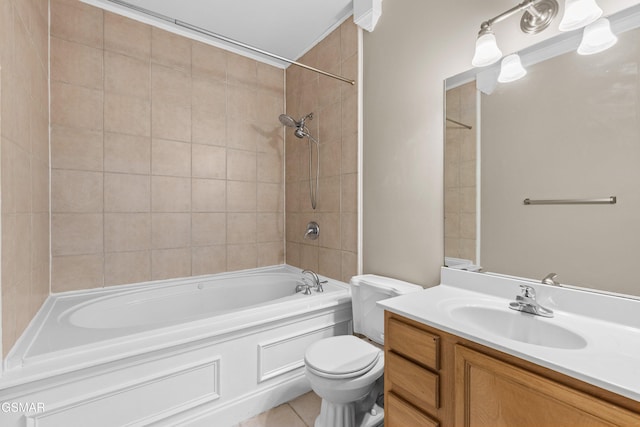 bathroom featuring toilet, tile patterned floors, vanity, and shower / bathtub combination