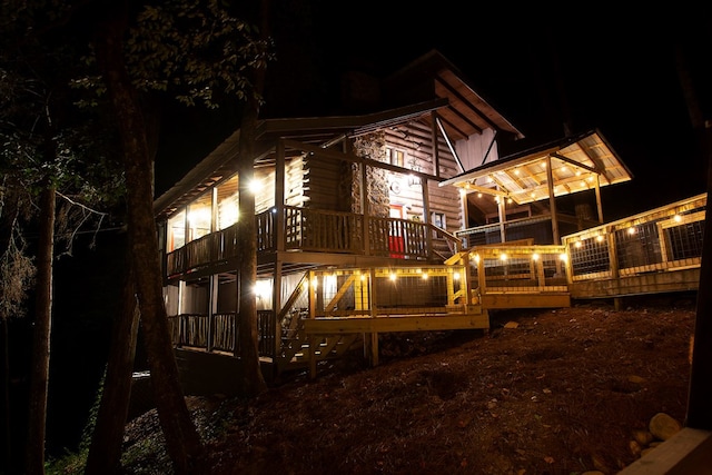 view of back house at night