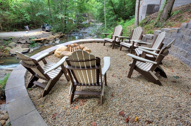 view of patio featuring a fire pit