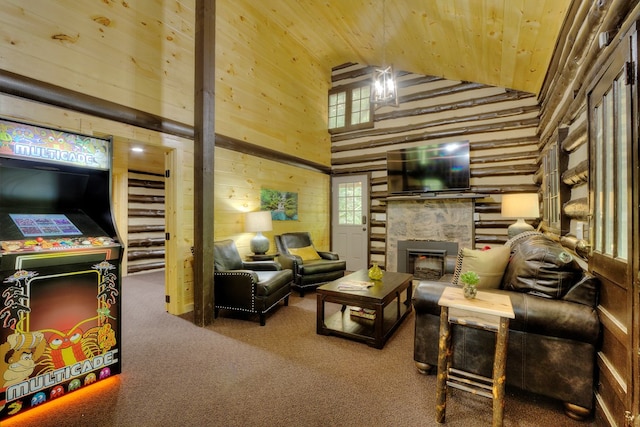 living room featuring high vaulted ceiling, wood walls, a fireplace, carpet, and wood ceiling