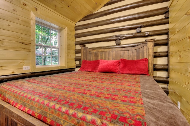 bedroom with wooden ceiling, lofted ceiling, and wood walls