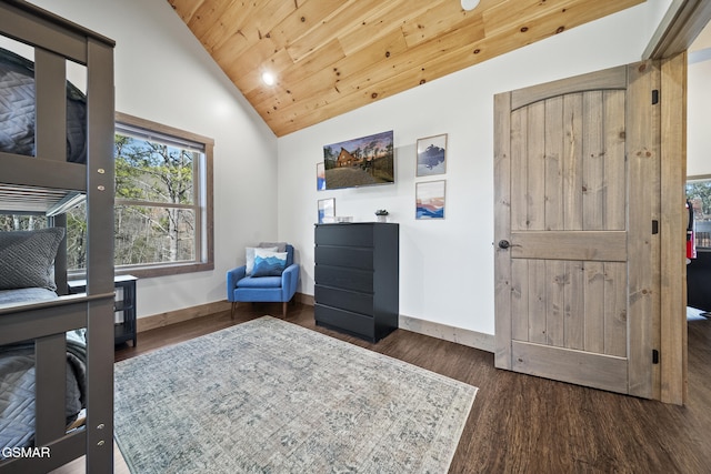 bedroom with vaulted ceiling, wood ceiling, wood finished floors, and baseboards