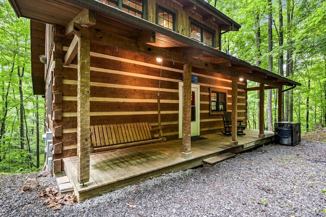 view of side of property featuring a deck