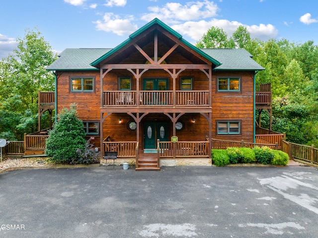 log home with a balcony