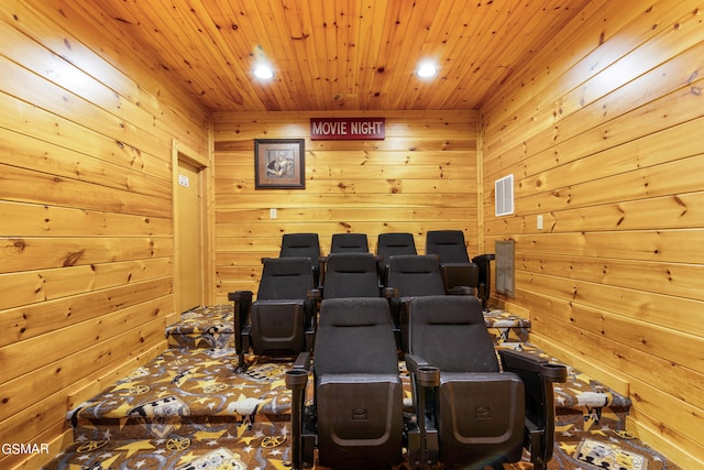 home theater room with wood ceiling