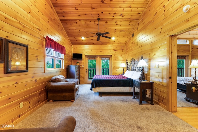 carpeted bedroom with access to exterior, high vaulted ceiling, and wood ceiling