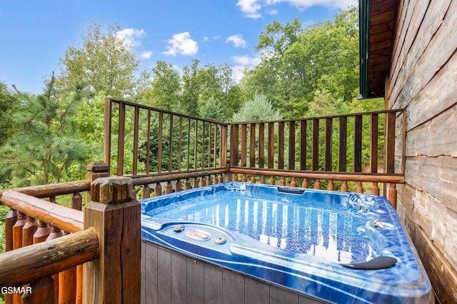 view of pool featuring a hot tub