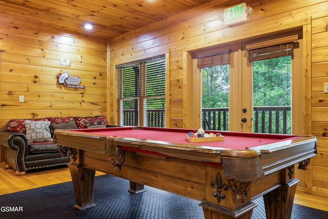 recreation room featuring wood-type flooring, wooden ceiling, wood walls, and billiards