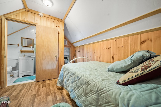 3176 Mcgill Rd, Sevierville, TN 37862 - bedroom featuring lofted ceiling, wooden walls, and wood finished floors