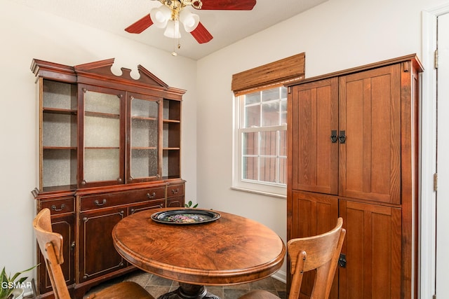 dining area featuring a ceiling fan