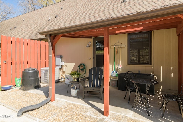 view of patio featuring fence