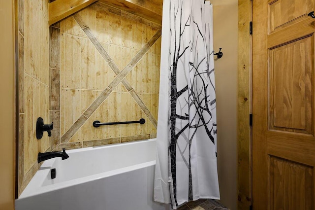 bathroom with shower / tub combo