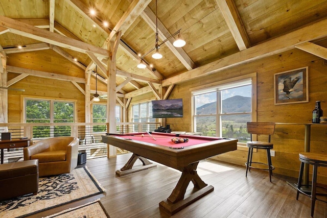 recreation room with wooden walls, wooden ceiling, beamed ceiling, billiards, and hardwood / wood-style floors