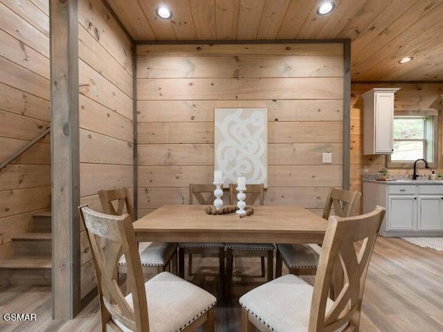 2434 Breezy Rd, Sevierville, TN 37876 - dining area featuring recessed lighting, wooden ceiling, wood walls, and light wood finished floors