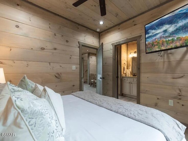 2434 Breezy Rd, Sevierville, TN 37876 - bedroom with wood ceiling, wood walls, and ensuite bathroom