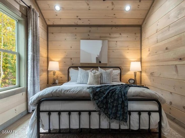2434 Breezy Rd, Sevierville, TN 37876 - bedroom featuring wood walls and wood ceiling