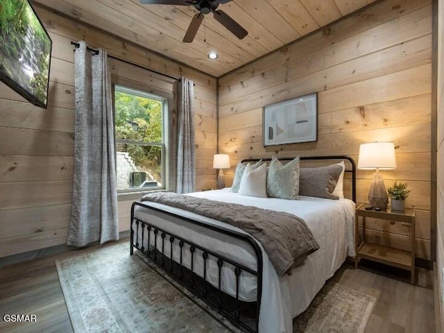 2434 Breezy Rd, Sevierville, TN 37876 - bedroom featuring wood ceiling, wood finished floors, wooden walls, recessed lighting, and a ceiling fan