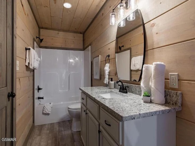 2434 Breezy Rd, Sevierville, TN 37876 - full bathroom with wood finished floors, wood walls, toilet, wood ceiling, and vanity